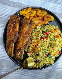 Fried Rice, plantain, and Titus Fish